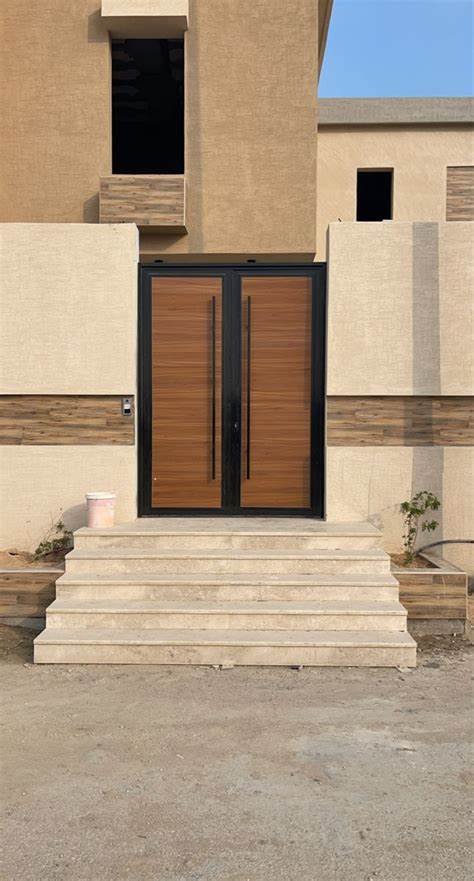 ورشة تفصيل ابواب بالرياض ابواب خشب ابواب حديد ابواب المنيوم تفصيل ابواب خارجية ورشة صناع الاتقان لتفصيل جميع انواع الابواب بالرياض تصليح ابواب حديد